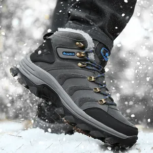 Close-up of a grey waterproof winter snow boot with warm fur lining and thick sole