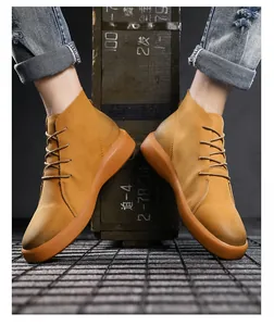 Detailed close-up view of men's genuine leather high-top casual work boots in yellow