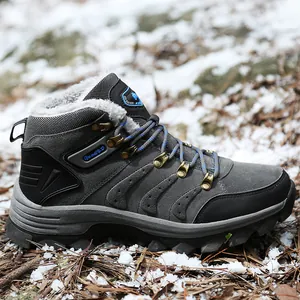 Close-up detail of grey waterproof outdoor hiking boots with warm faux fur lining