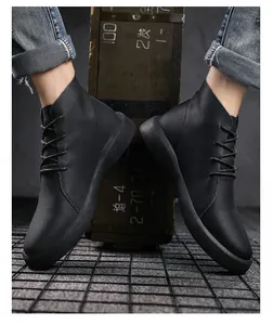 Close-up of black genuine leather high-top boots featuring a textured pebble finish.