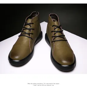 Premium men's olive green leather tooling boots featuring black laces and thick soles