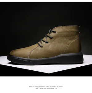 Side view of a brown leather men's work boot with black laces and durable sole.