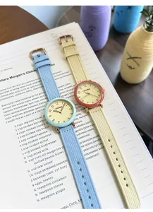 Detailed macro view of Gccliyo quartz watches with colorful straps and minimalist dials