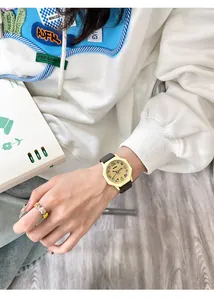 Detailed view of GCCLIYO dopamine style quartz watch worn on a wrist in a lifestyle setting