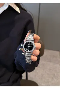 Elegante reloj Dimini para mujer con esfera de cielo estrellado y brillantes strass.