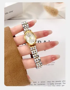 Vintage style Gedi small oval quartz watch for women with gold and silver steel band