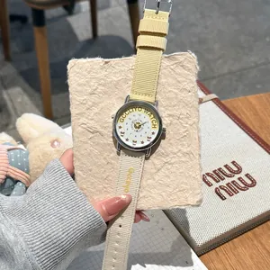 GCCLIYO vintage unisex quartz watch with yellow nylon strap and bear dial