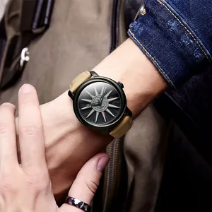 Close-up of fashion quartz watch with sunray dial on male wrist with denim jacket.