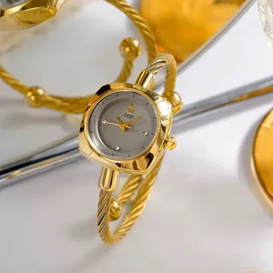 Elegante reloj de pulsera GEDI dorado con correa de cuerda metálica trenzada y logo