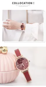 Detailed shots of Kimio women's starry red watch with rose gold finish on wrist