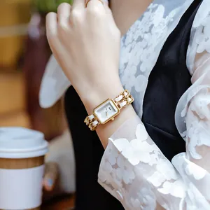 Gedi elegant women's watch with gold rectangular face and white woven chain strap