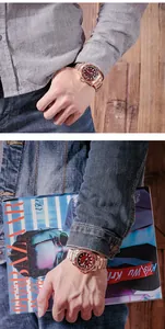 Stylish GUOU men's rose gold watch with red dial and calendar on a denim sleeve
