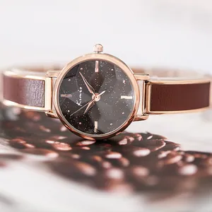 Elegant Kimio women's watch featuring a starry sky dial and rose gold metal strap