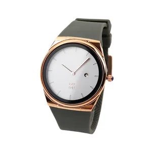 Minimalist quartz watch with grey silicone strap and rose gold date display dial