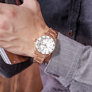 Sophisticated GUOU men's watch with rose gold stainless steel strap and calendar on wrist
