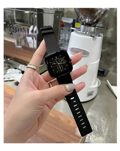 Detailed close-up of TICTOC black silicone unisex watch featuring a stylish square dial