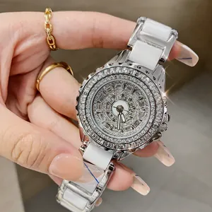 Elegant full diamond women's watch with white ceramic links and shimmering rhinestone face