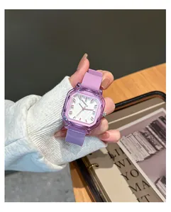 Elegant purple square quartz watch with a soft silicone strap worn on a female wrist.