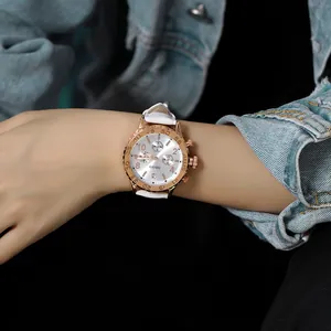 GUOU women's rose gold quartz watch featuring a white leather strap and three sub-dials