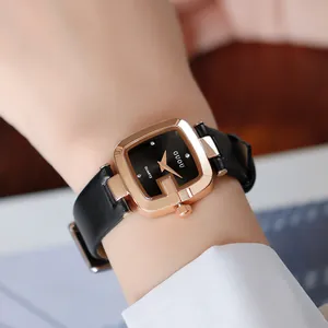 Detail view of a stylish GUOU women's quartz watch with a G-shaped rose gold case.