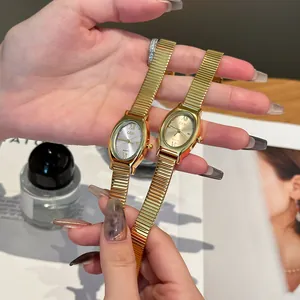 Elegant GEDI minimalist oval quartz watch for women with golden elastic expansion band