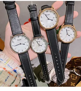 Detailed view of Dinimi women's quartz watch with shell dial and leather strap