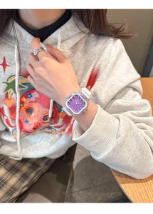 Elegant women's square quartz watch featuring a purple dial and premium white silicone strap