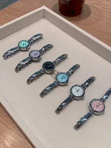Detailed view of GEDI minimalist quartz bracelet watches in multiple dial colors