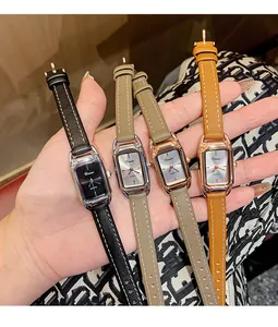 Detailed view of vintage rectangular ladies' quartz watches in multiple strap colors.