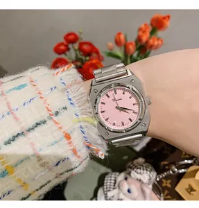 Close-up of Dinimi women's octagonal steel quartz watch with pink dial