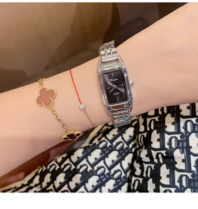 Close-up of Dinimi elegant silver steel strap ladies watch with black rectangular dial