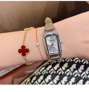 Elegant rectangular women's watch with leather strap and minimalist silver dial