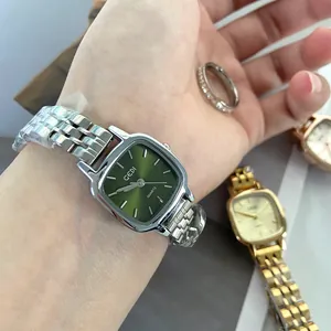 Elegant GEDI women's quartz watch featuring a square green dial and polished silver steel strap
