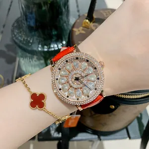 DINIMI women's fashion watch with red leather strap and rotating diamond petal dial