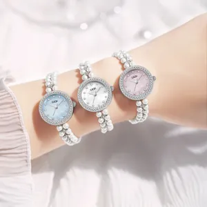 Montre à quartz élégante GEDI pour femmes avec bracelet en perles et cadran en strass