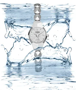 Macro view of GEDI silver quartz watch with faceted bracelet and water splash detail