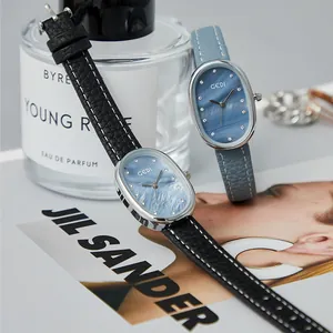 Reloj de Cuarzo GEDI para Mujer Minimalista Esfera Ovalada de Concha Correa de Cuero Strass Elegante Reloj de Pulsera Impermeable