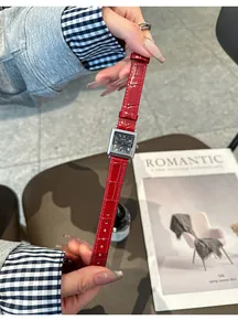 Close-up of GUOU women's square watch with vibrant red crocodile pattern strap.