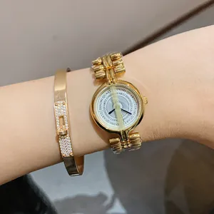 Elegante set orologio al quarzo dorato e bracciale da donna con quadrante tondo