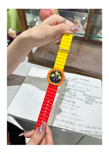 Detail view of a vibrant dopamine-style silicone watch with cute cartoon star patterns