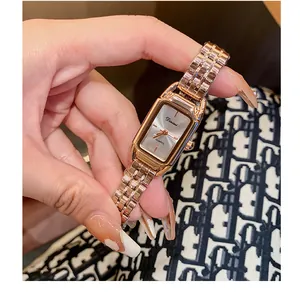 Detailed shot of a rose gold Dinimi quartz watch with an elegant rectangular dial