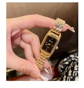 Close-up of Dinimi fashion gold-tone women's quartz watch with rectangular black dial