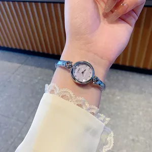 GEDI elegant silver bracelet watch featuring a lavender dial and crystal hour markers