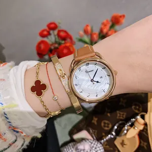 Elegant Dinimi ladies quartz watch with white shell dial and brown leather strap