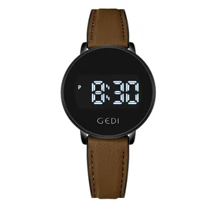 Montre numérique GEDI élégante pour femme avec bracelet en cuir marron et cadran rond noir.
