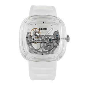 Stylish square mechanical watch with a transparent case and a white silicone strap.