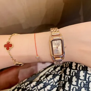 Elegant Dinimi rose gold steel strap quartz watch for women with rectangular case design.