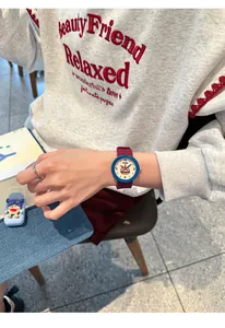 Detail of preppy silicone watch with hamburger illustration and blue contrast case
