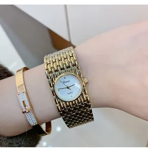 Elegant gold Dinimi quartz bracelet watch for women with a stylish textured band
