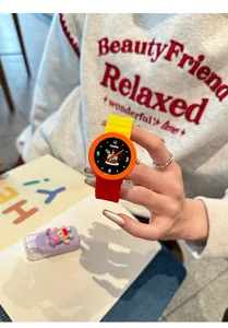 Close-up view of a vibrant GCCLIYO silicone watch featuring a cute character illustration